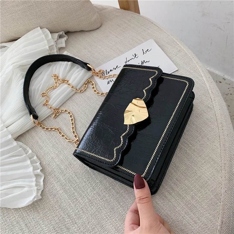 Irregular leaf magnetic buckle women's bag new summer small fresh car stitching shoulder slung chain small square bag - Цвет: Черный