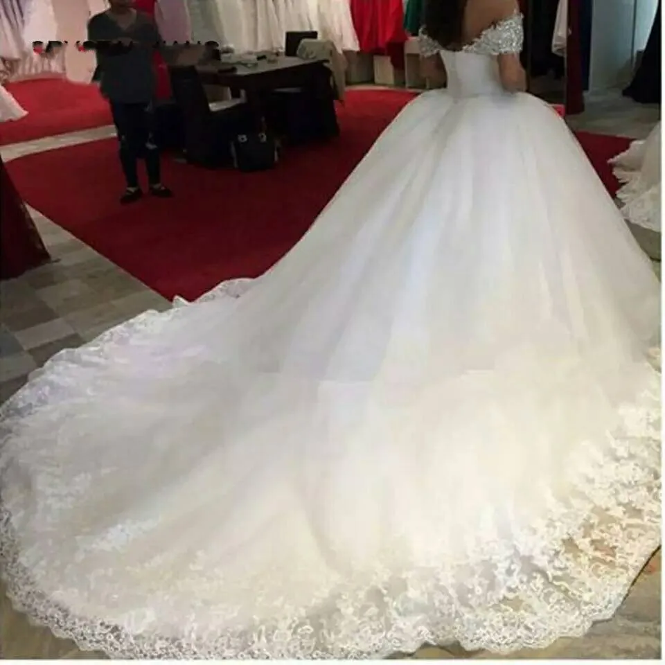 

Beads Wedding Dresses Long Fashion Wedding Gown Appliques Wedding Dress Corset robe de mariee Puffy Bridal Gowns Train Tail