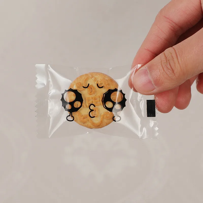 

100 Pcs Mini 4.5x7.5cm 8 Style Cartoon Face Transparent Button Biscuit Packaging Cookie Snack Machine Sealing Bags