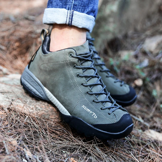 HUMTTO-zapatos de senderismo de cuero para hombre y mujer, botas