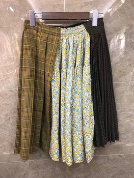 

2020 autumn and winter new women's plaid color matching stitching printing pleated midi skirt 1010