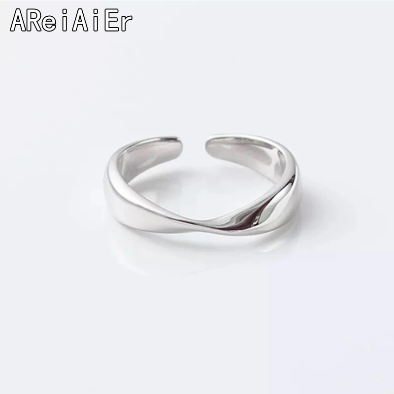 

Simple personality irregular twist ring open Korean fashion tide with smooth surface wave ring couple ring female ring male ring
