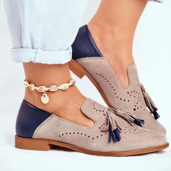 Женские мокасины с перфорацией типа броги на плоской подошве из натуральной