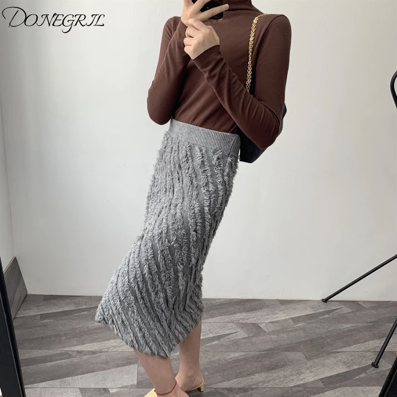 

2019 autumn winter women elegant skirt fringed feather skirt with solid color knitted Pencil skirt