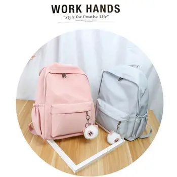 

New Waterproof Solid Color Canvas Backpack Preppy Style Women's Plush Pendant Backpack
