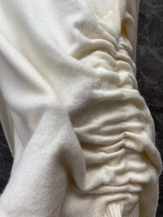 Autumn and winter new women's round neck side drawstring wrinkle decoration solid color long sleeve wool sweater 1014