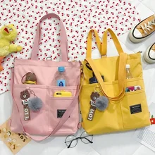Girl's canvas schoolbag 2020 new multi-purpose light tutorial backpack for primary school students Single Shoulder Messenger