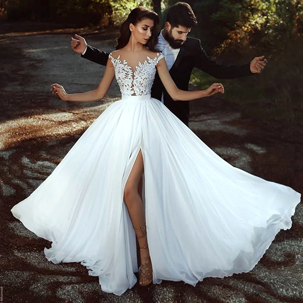 Illusion Wit Chiffon Trouwjurk 2020 Strand Bruidsjurken Voor Wedding Party Sheer Hals Betaalbare Kant Robe De Huwelijk Lange Illusion Wit Chiffon Trouwjurk 2020 Strand Bruidsjurken Voor Wedding Party Sheer Hals Betaalbare Kant Robe De Huwelijk Lange