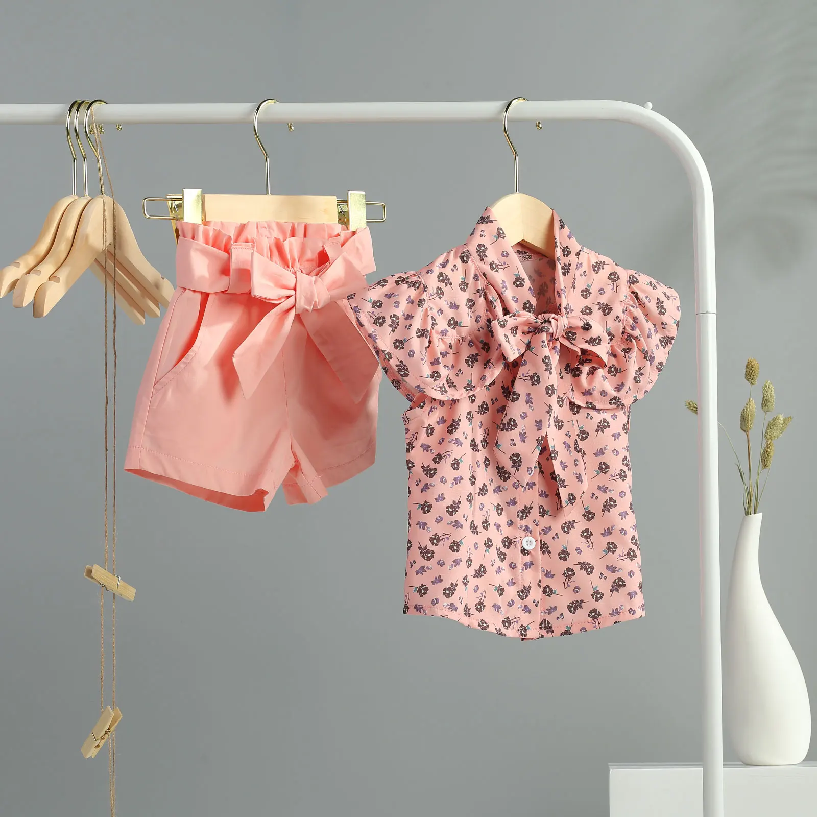 Ropa para niñas pequeñas, 2 uds., verano 2021, con estampado Floral, volantes, Bowknot, sin mangas, Tops + pantalones cortos de cintura alta