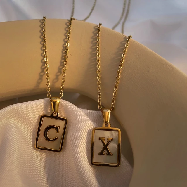 Louis Vuitton's Gold Initial Necklace