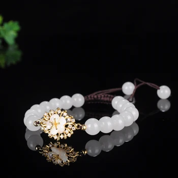 

Xinjiang gold silk jade bracelet ball sheep fat white jade female hand string