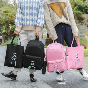 

New fashion bow streamers in college women's backpacks canvas multi-layer Korean version of the backpack to send shopping bags