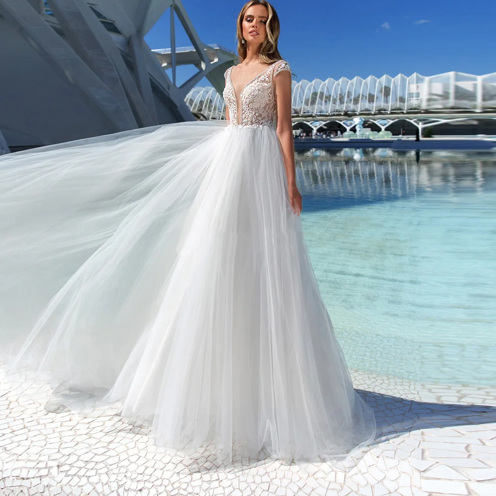 

Vestido De Noiva Beach A Line Tulle Wedding Dresses V Neck Cap Sleeves Illusion Button Wedding Bridal Gowns