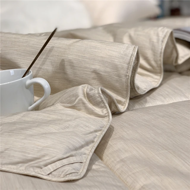 Experience the luxury and comfort of the 100% Merino Wool Filling Comforter