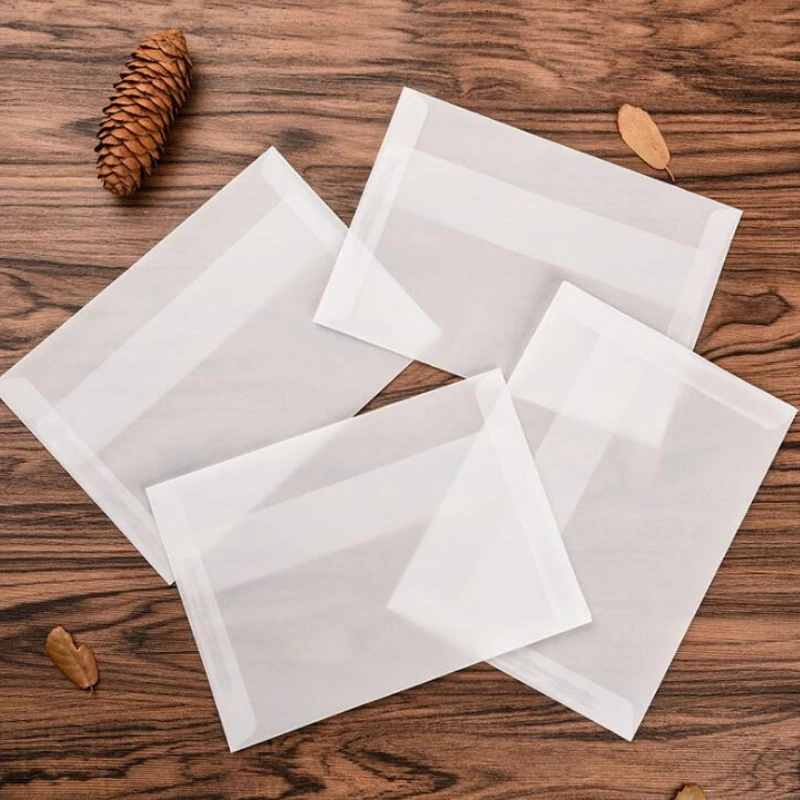 уголок для гамбургера 155х170мм крафт. конвертик из пергамента. конвертик из пергамента. конвертик пергаментнаябумаги. конверт из крафт бумаги.