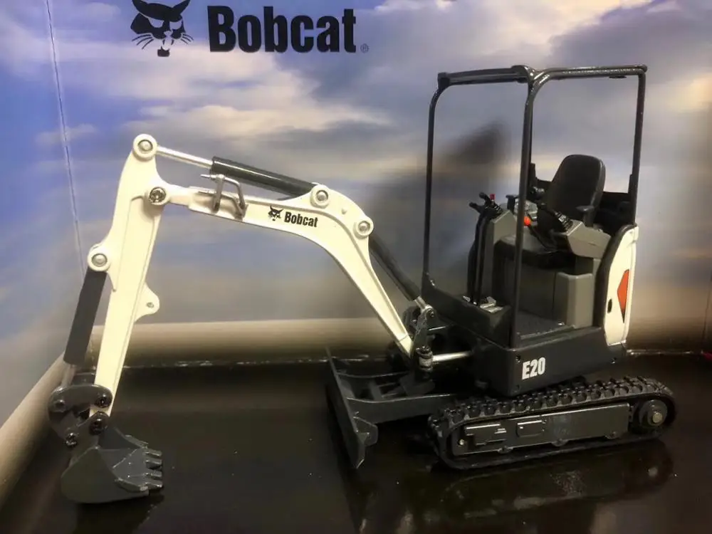 

Universal Hobbies 1/25 Scale BOBCAT EQUIPMENT E20 Compact Excavator DIECAST MODEL UH8099