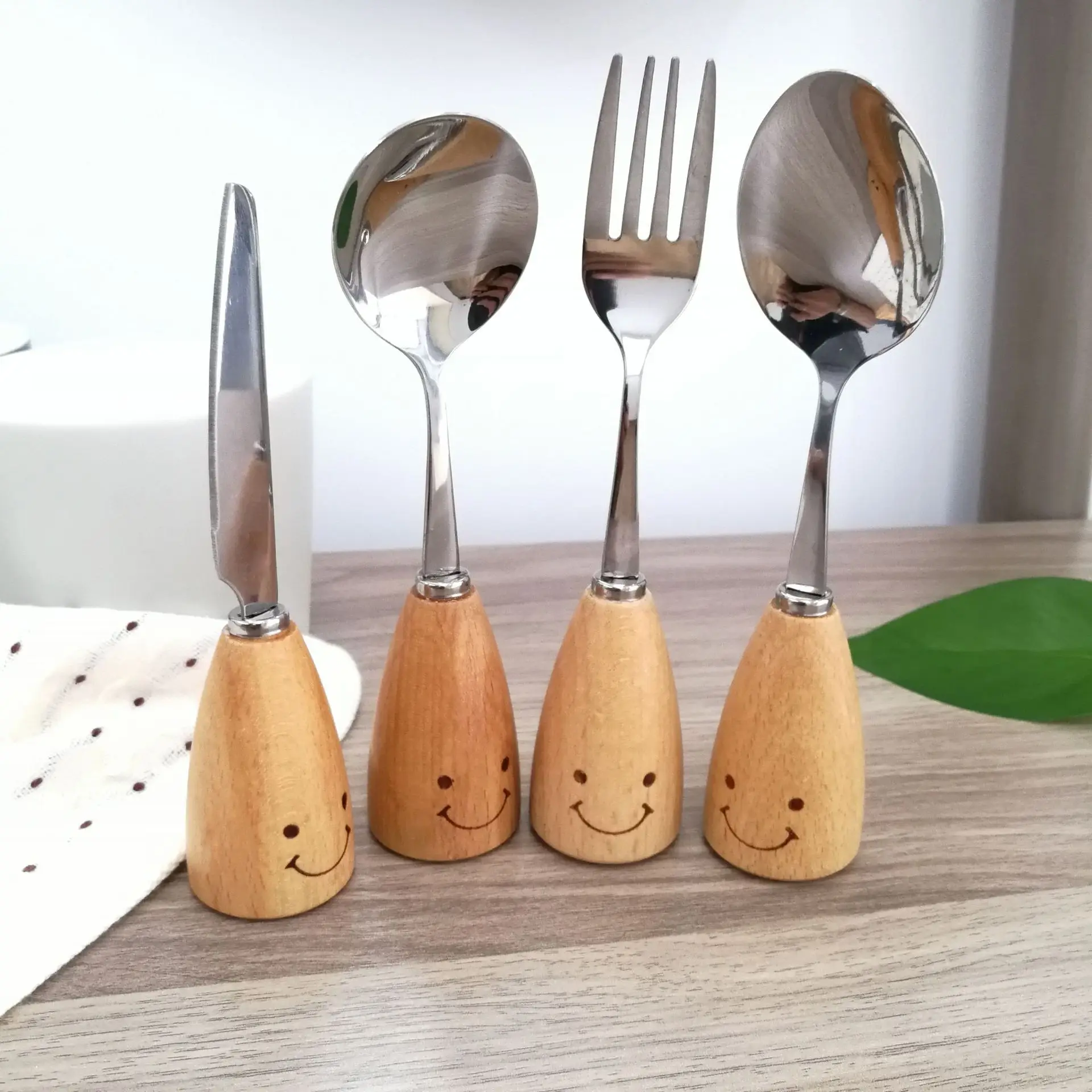 Cute smiling face cutlery set with wooden handle UNEEDE - UNEEDE