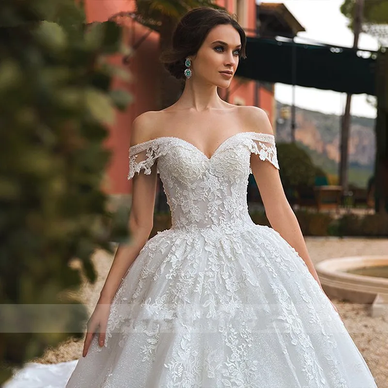 On Zhu Ball Gown Princess Wedding Dresses Beaded Sweetheart Cap Sleeve Lace Appliques Lace Up Bride Robe De Mariage Royale