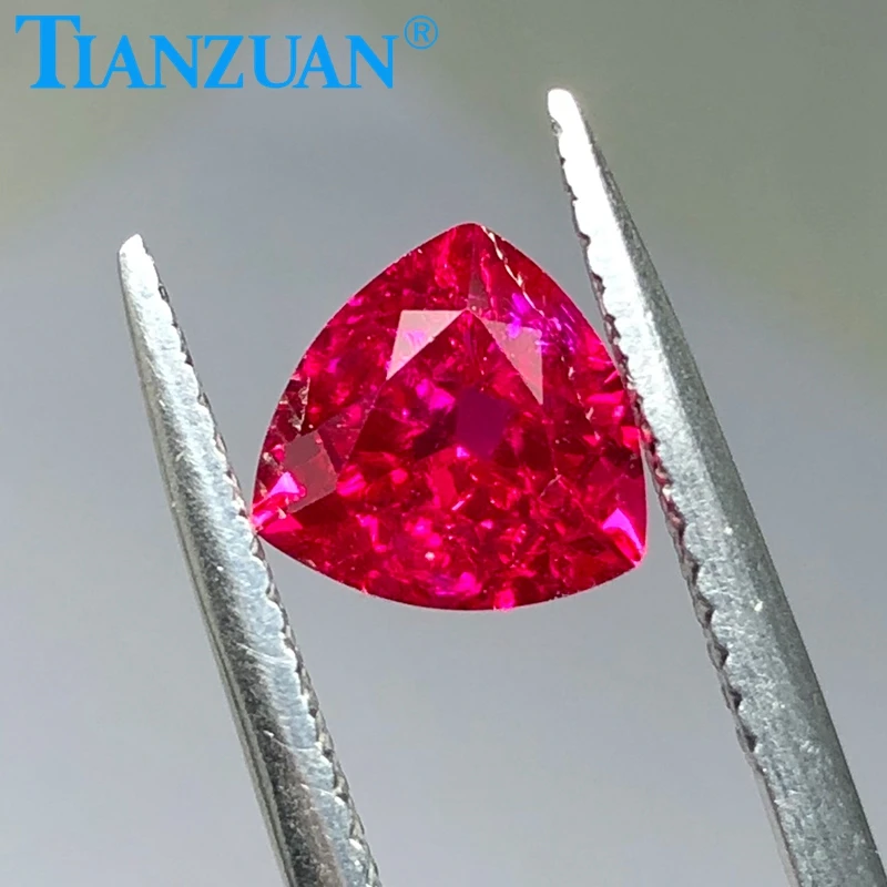 

trillion shape natural cut 5# red color created Artificial ruby corundum stone with cracks and inclusionsloose stone