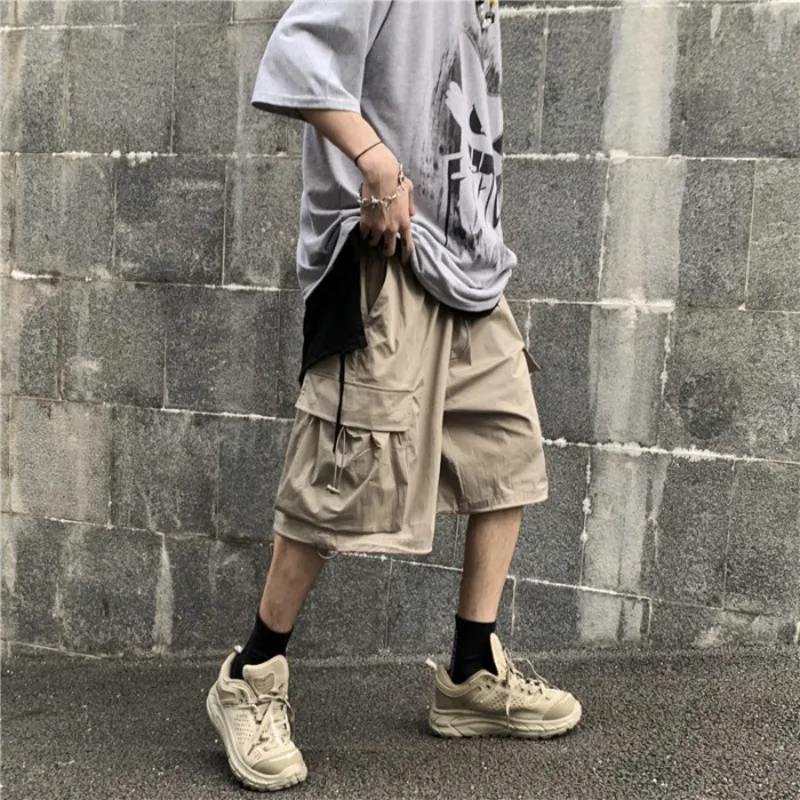 Summer Casual Shorts Men's Fashion Solid Color Multi-pocket Tooling Shorts Men Streetwear Wild Loose Hip Hop Shorts Mens Summer Casual Shorts Men's Fashion Solid Color Multi-pocket Tooling Shorts Men Streetwear Wild Loose Hip Hop Shorts Mens