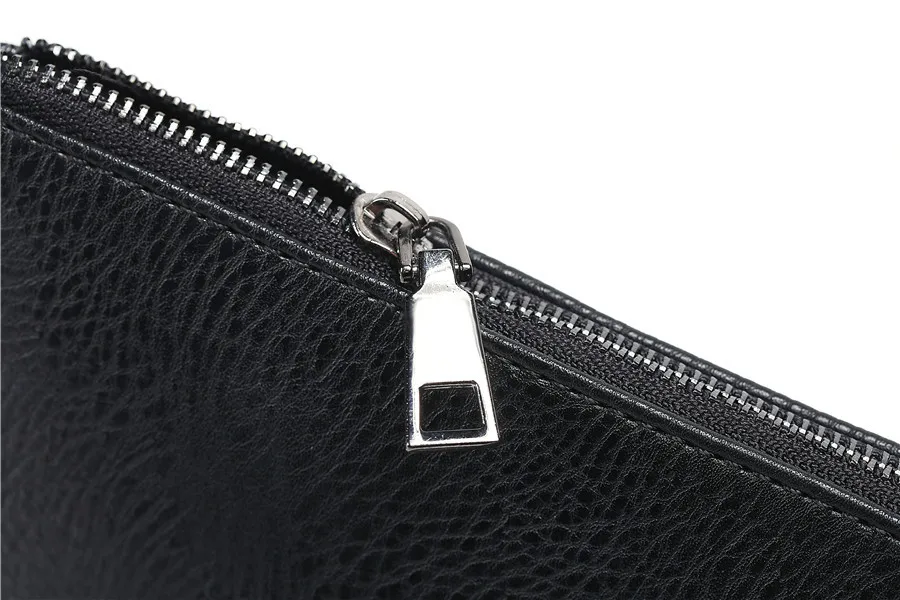 Personality pattern three-dimensional street leather wrist bag Korean version of fashionable men's hand bag