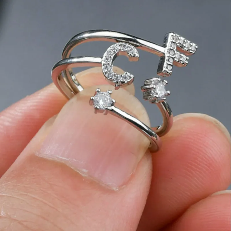 Мужское и женское кольцо с буквами простое классическое из белого золота