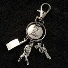 В европейском и американском стиле Популярные брендовые аксессуары с изображениями из сериала «Ходячие мертвецы» зомби Resident Evil брелок измельчитель мужской брелок пистолет