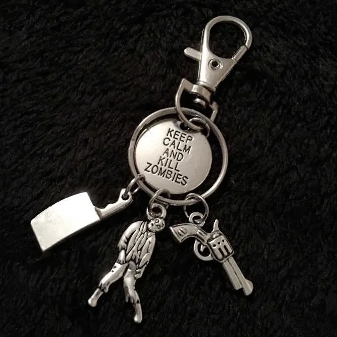 

Europe And America Popular Brand Accessories Walking Dead Resident Evil Zombie Keychain Chopper Gun Key Chain