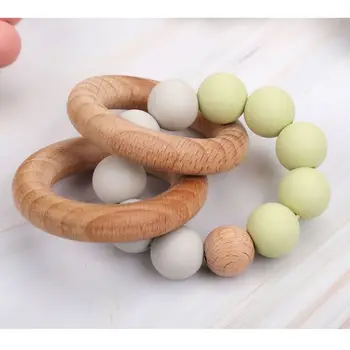 

Baby Teether Teething Beech Wooden Bracelet Shower Gift Play Gym Toy Baby Rattle CORB