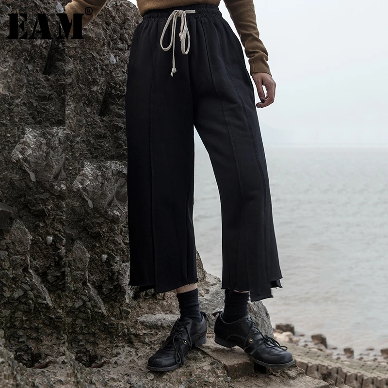 [EAM] Черные Асимметричные широкие брюки с высокой эластичной талией, новые свободные брюки, женские модные весенние осенние 19A-a439