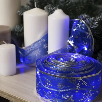 

Garland "Thread" 9 m with ribbon "Silver Snowflakes", IP20, transparent thread, 72 LED, blue glow, 8 modes, 220 V
