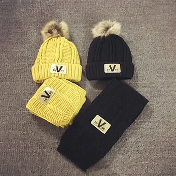 

2019 winter new children's hat creative models large V letter hair ball plus velvet warm wool scarf two-piece