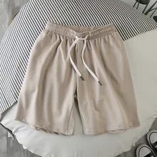 Pantalones cortos informales para hombre, Shorts holgados de secado rápido para la playa, ropa deportiva de Cintura elástica de tres cuartos, A50
