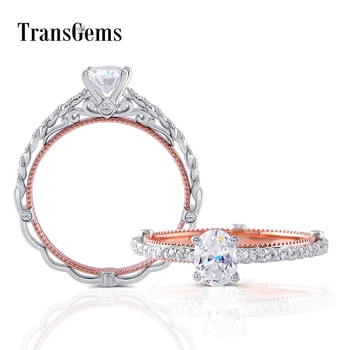 

TransGems Solid 14K 585 White and Rose Gold Center 0.6ct 4X6mm F Color Oval Moissanite Engagement Ring for Women With Accents
