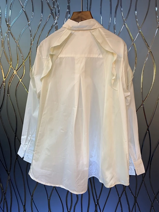 Early autumn new women's Lapel irregularly stitched long sleeve loose shirt 814