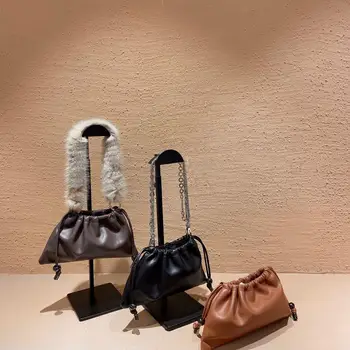 

New high quality leather fashion trend personality double chain ring buckle Street muffin underarm bag hand leather women's bag