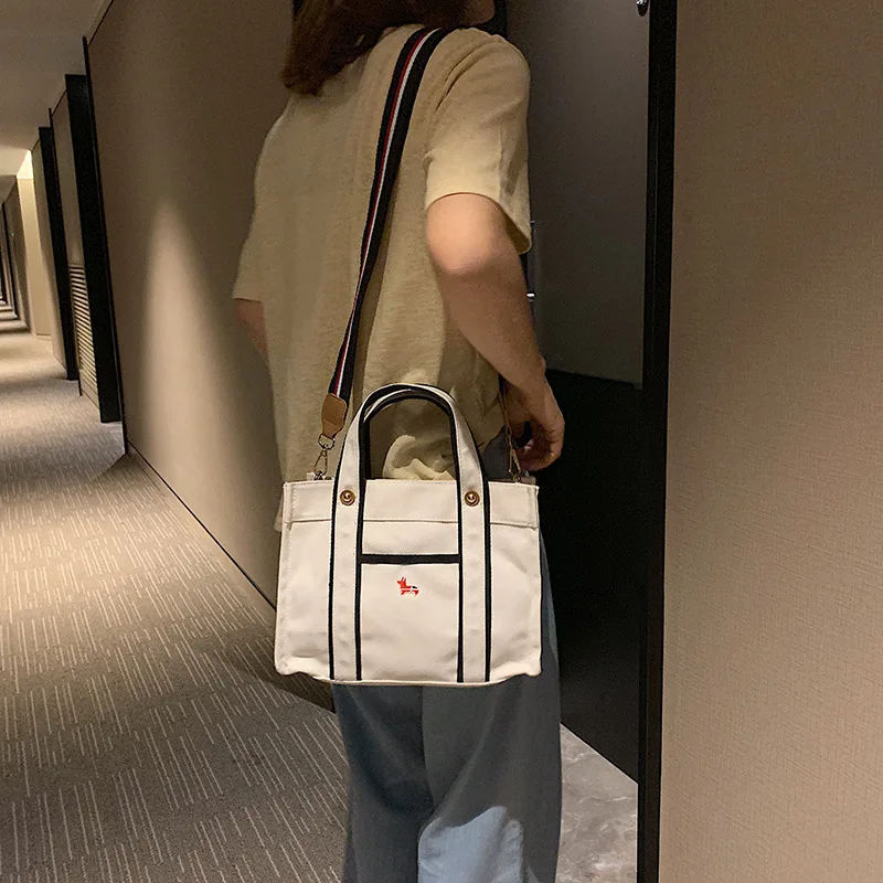 

handbag, leisure college students junior high school students'schoolbag, canvas, Korean version of the trend across the bag
