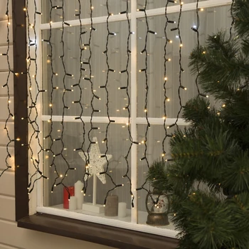 

Garland "Curtain" 2 x 1.5 m, IP65, dark thread, 360 LED, warm white glow, white flicker, 220 V
