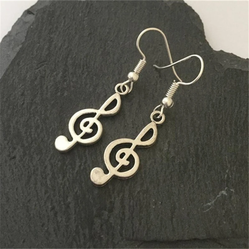 серьги музыкальные ключи. с1323120. ноты серьги гвоздь. серьги ноты и скрипичный ключ. серьги ноты и скрипичный ключ.
