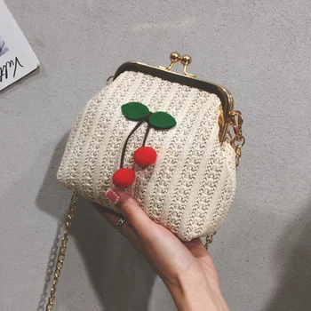 

Straw woven bucket bag female 2020 spring and summer new Korean tide small fresh woven shoulder messenger clip buckle chain bag
