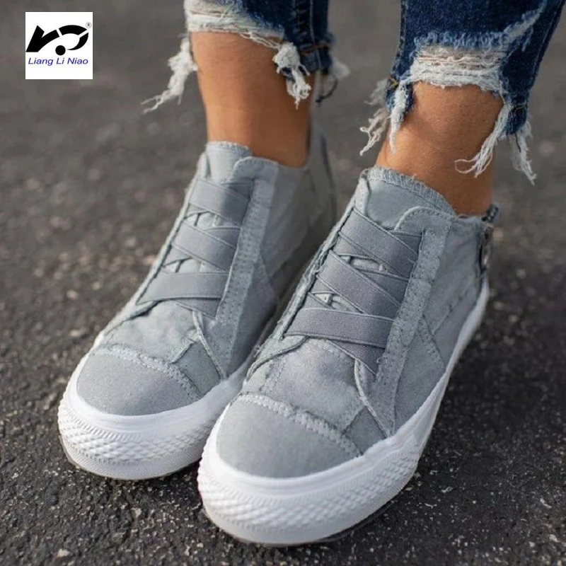 white flat canvas shoes