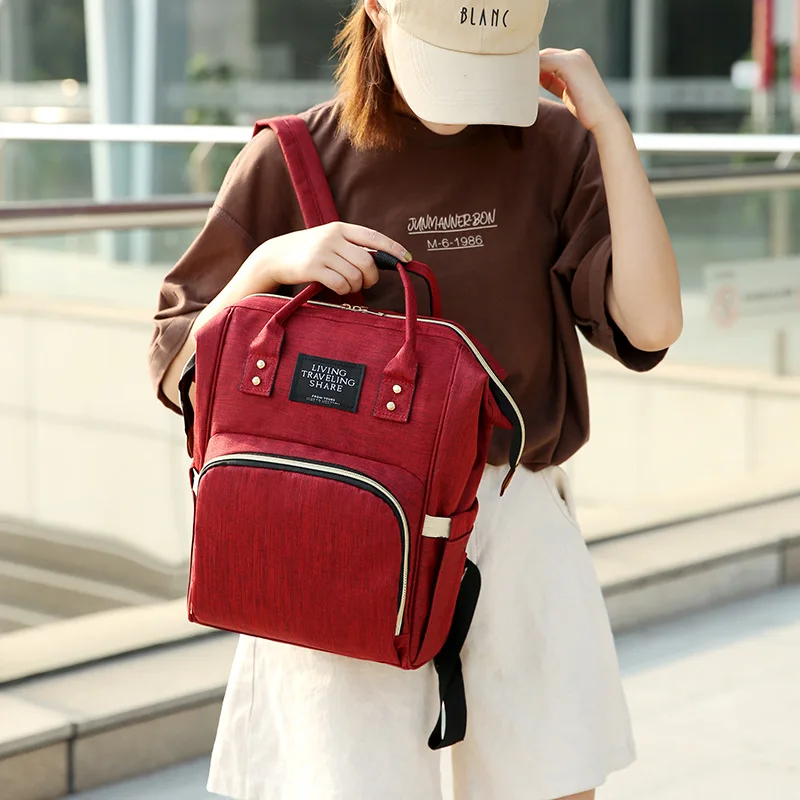 Мульти-функциональный большого объема сумка из узорчатой ткани Водонепроницаемый рюкзак для мам в Корейском стиле зажима открытия матери мешок