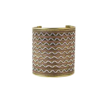 

Slightly color over metal cuff bracelet carved