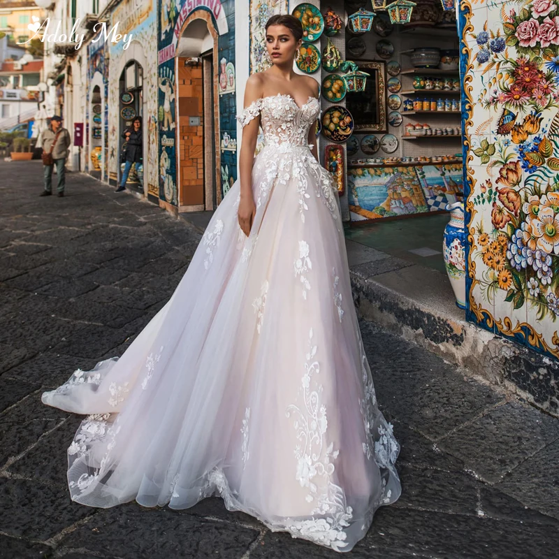 

Adoly Mey New Arrival Charming Boat Neck Lace Up A-Line Wedding Dresses 2020 Luxury Appliques Court Train Princess Bridal Gown