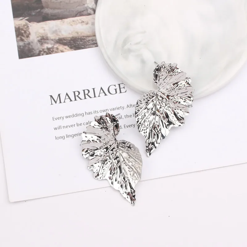

EC1016 Women's Irregular Leaves Stud Earrings Geometric Fashion Jewelry Tiny Brincos Bijoux Earrings Gold Silver Stud Earrings