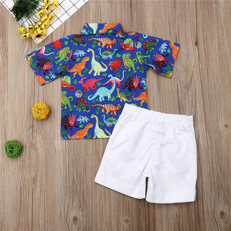 Детская одежда на каникулы для маленьких мальчиков Летние комплекты для девочек футболки с изображением динозавра Белые шорты комплект из