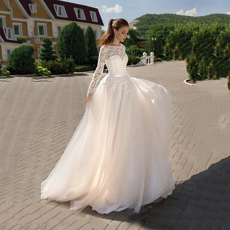 

Pastrol Long Sleeves Lace Appliques Wedding Dress Elegant Tulle O-Neck A-Line Floor Length Lace Up Backless Bridal Gown 2022