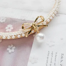 Korean-style Creative Fashion Women's Anti-Exposure Bow Pearl Brooch Simple Fixed Suspender Pants Anti-slip Safety Pin