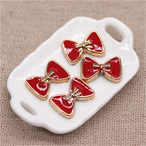 red 50pcs 50 шт. 10*14 мм бант черный/белый/красный эмаль золотой пластик плоская кнопка DIY бижутерия для декорирования/ремесло скрапбук аксессуары - Цвет: red 50pcs