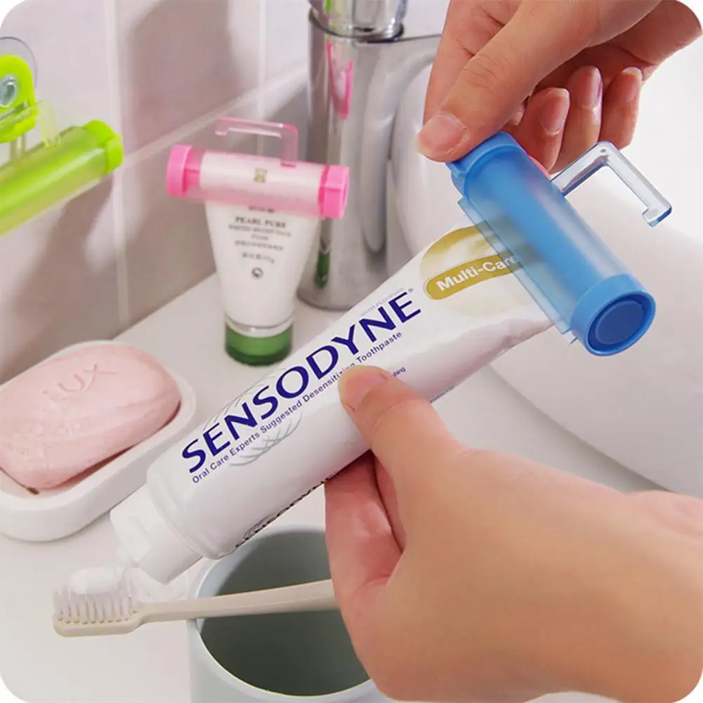 

TPFOCUS Rolling Squeezer Toothpaste Dispenser Multifunction Suction Cup Hanging Manual Dispenser for Toothpaste Facial Cleanser